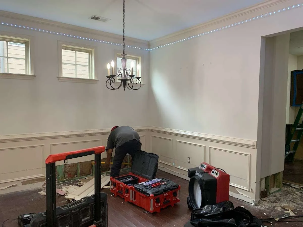 Restoration technician with professional equipment in Auburn